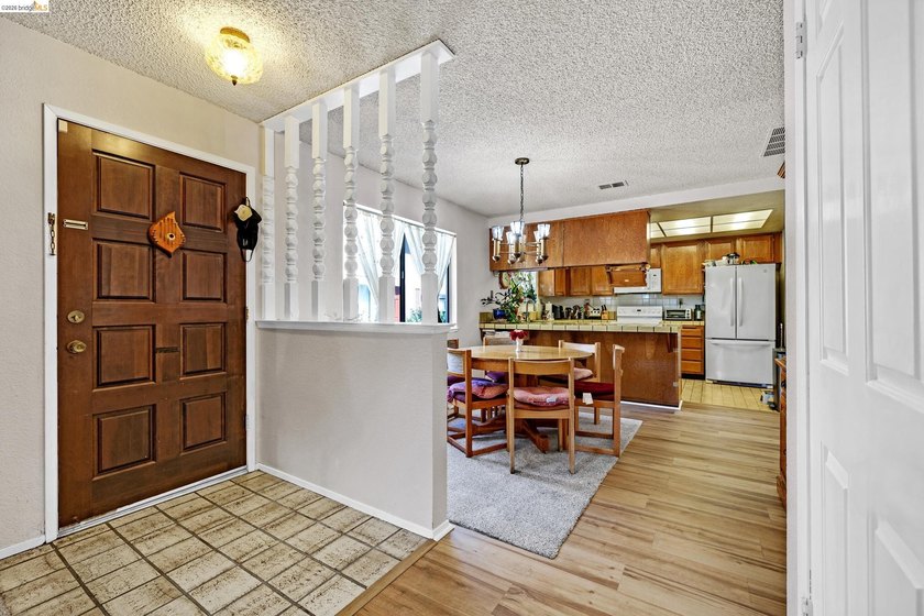 Welcome home to this beautifully designed 3-bedroom, 2-bath end - photo 4