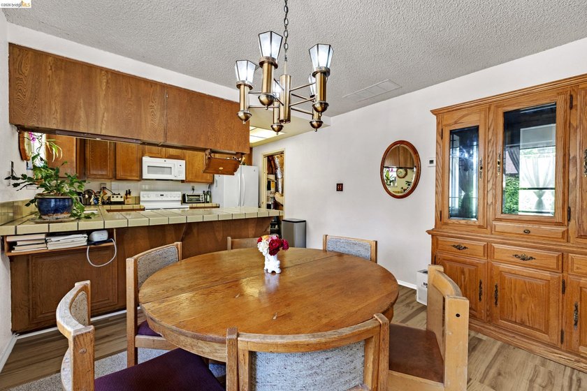 Welcome home to this beautifully designed 3-bedroom, 2-bath end - photo 6