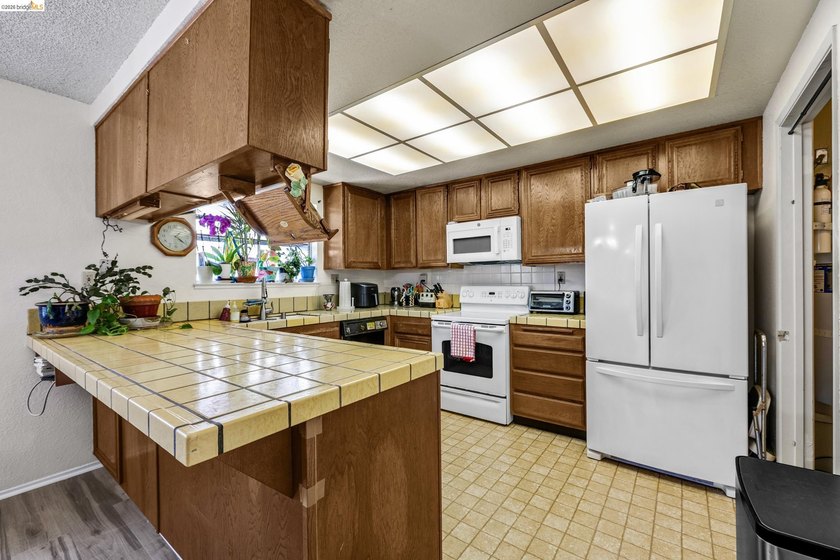 Welcome home to this beautifully designed 3-bedroom, 2-bath end - photo 7