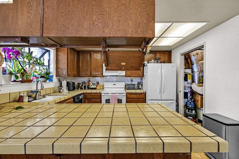 Welcome home to this beautifully designed 3-bedroom, 2-bath end - photo 8