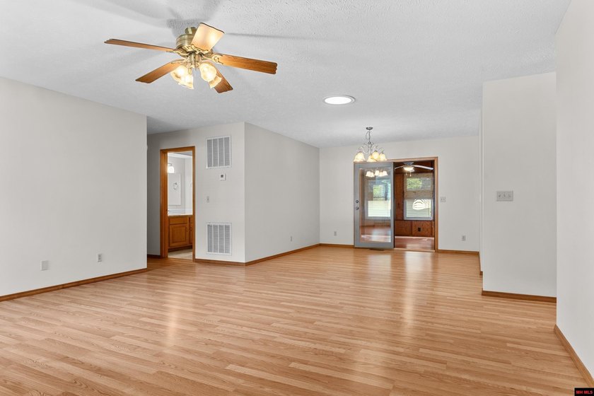 Spacious brick home on a beautiful corner lot offering over half - photo 4