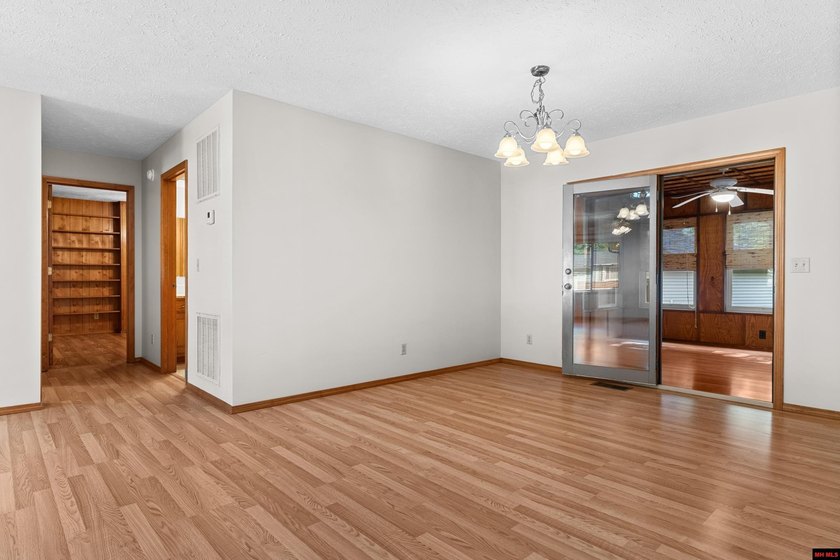 Spacious brick home on a beautiful corner lot offering over half - photo 6