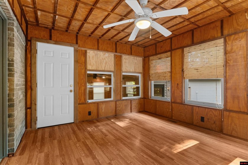 Spacious brick home on a beautiful corner lot offering over half - photo 7