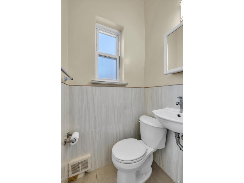 Welcome to this classic, all-brick semi-attached townhouse in - photo 11