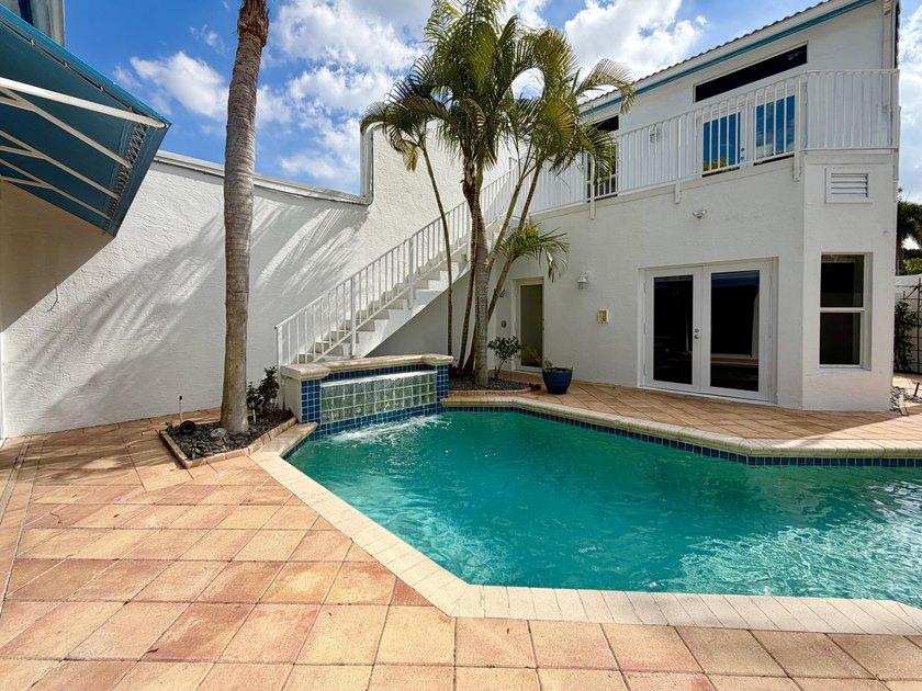 Beautifully designed residence featuring three distinct living - photo 11
