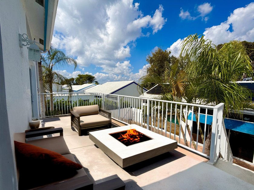 Beautifully designed residence featuring three distinct living - photo 13