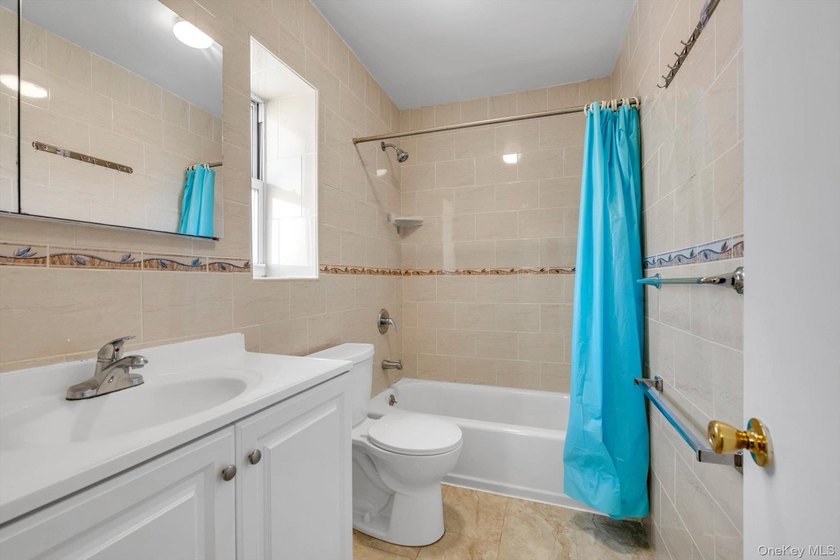 Welcome to this classic, all-brick semi-attached townhouse in - photo 18