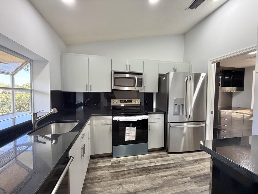 Beautifully designed residence featuring three distinct living - photo 30