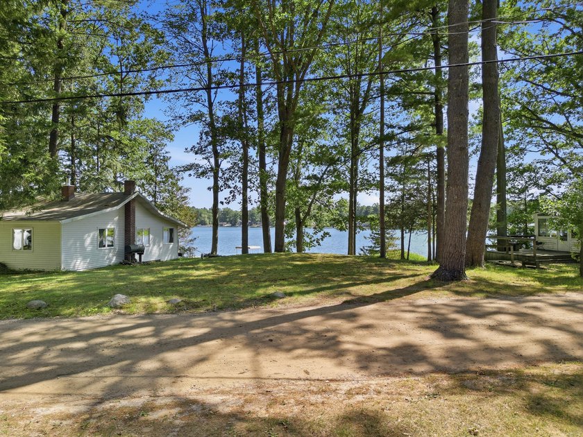 Escape to the lake without the waterfront price! This charming - photo 4
