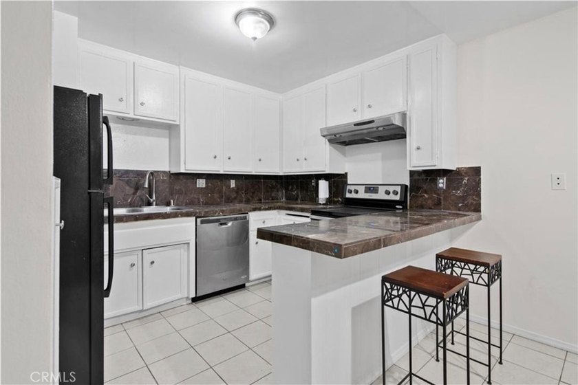 Ideally situated in a highly sought-after neighborhood just - photo 3