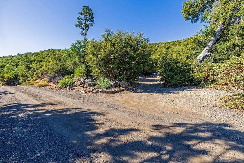 9.74 Acres with stunning panoramic views of mountains to the - photo 5