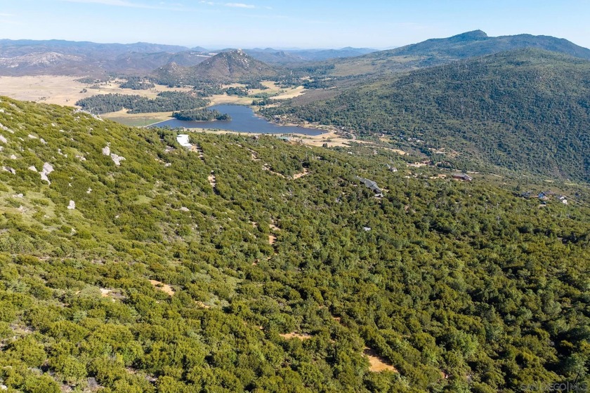 9.74 Acres with stunning panoramic views of mountains to the - photo 8