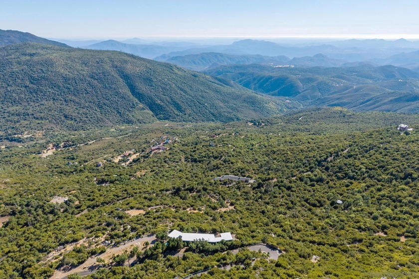 9.74 Acres with stunning panoramic views of mountains to the - photo 9