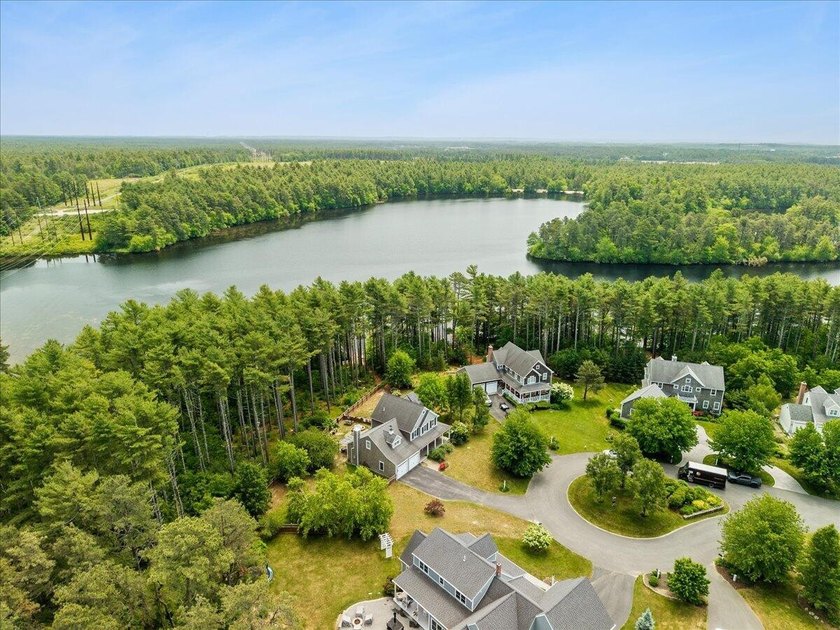 Overlooking Tihonet Pond, 22 Red Pine Lane offers a distinctive - photo 11