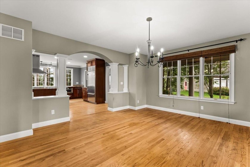 Overlooking Tihonet Pond, 22 Red Pine Lane offers a distinctive - photo 15