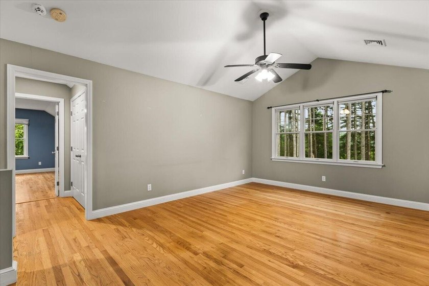 Overlooking Tihonet Pond, 22 Red Pine Lane offers a distinctive - photo 34