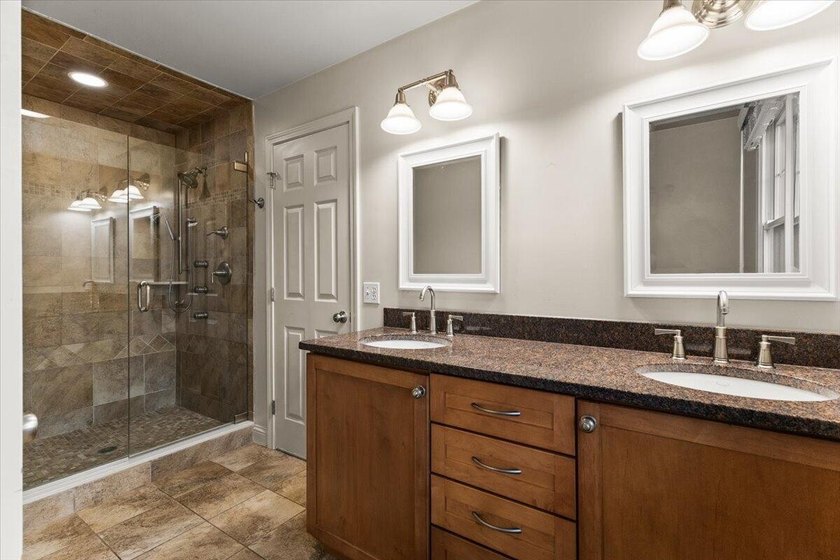 Overlooking Tihonet Pond, 22 Red Pine Lane offers a distinctive - photo 36