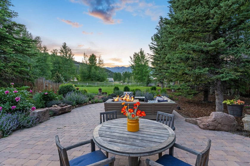 This exceptional 1.3-acre estate combines timeless architecture - photo 6