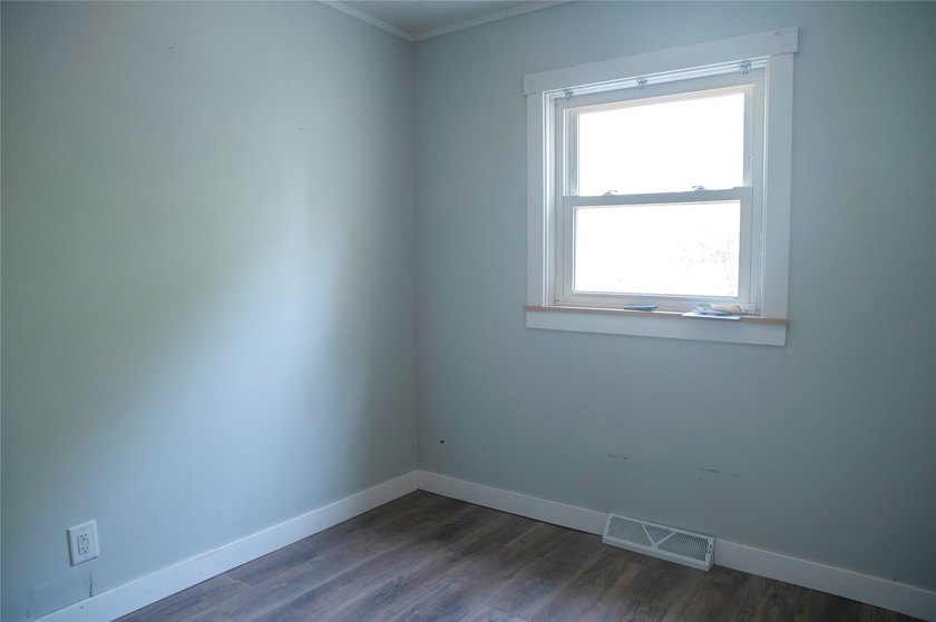 This updated home is move-in ready with fresh flooring, paint - photo 15