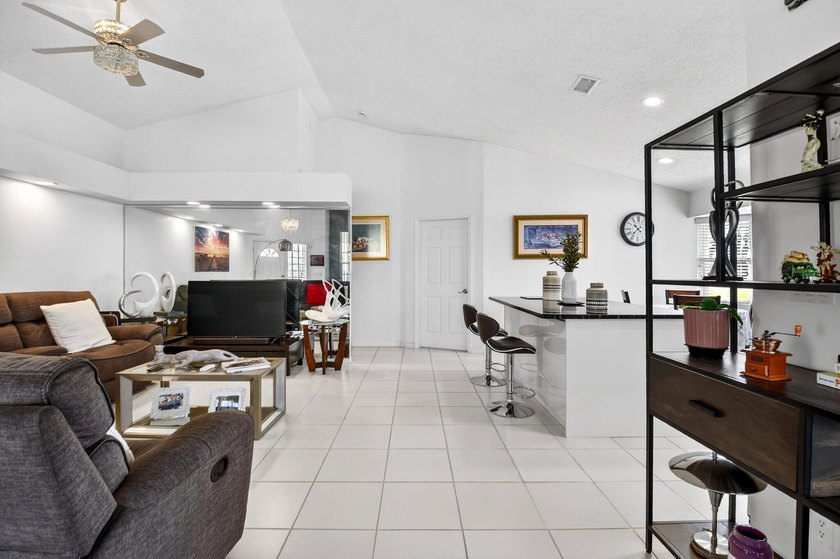 Welcome to a beautifully reimagined lakefront Turnkey home. This - photo 16