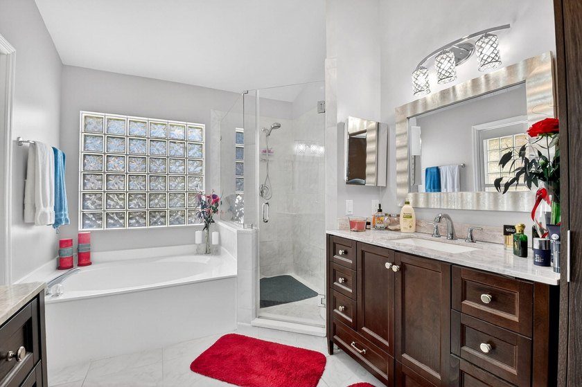 Welcome to a beautifully reimagined lakefront Turnkey home. This - photo 21