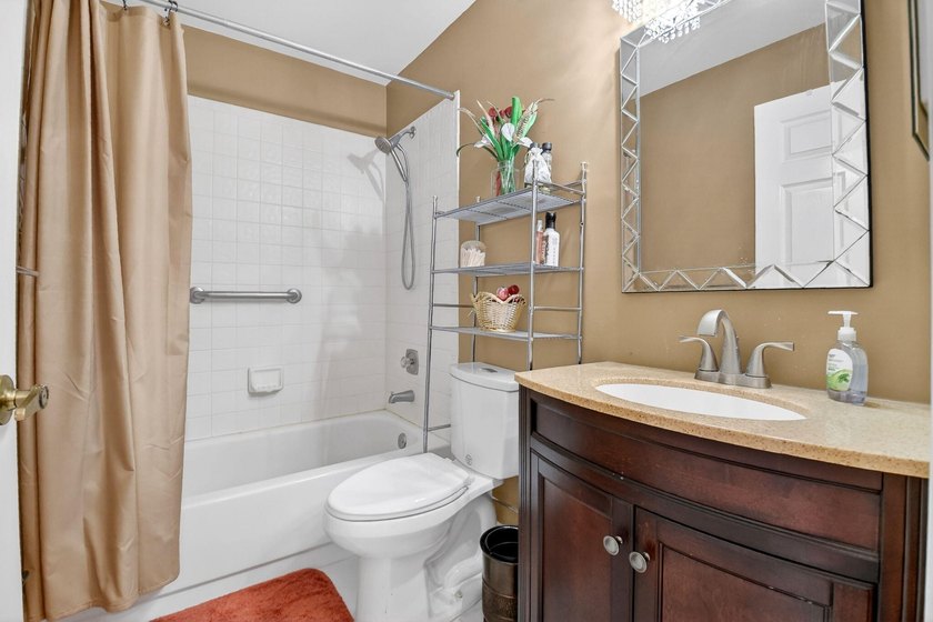 Welcome to a beautifully reimagined lakefront Turnkey home. This - photo 27