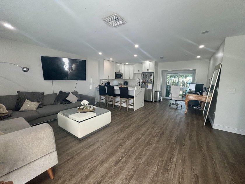 Welcome to this stunningly updated 2-bedroom, 1-bath villa! - photo 12