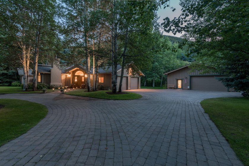 This charming home is a jewel on a mature one-acre lot. The - photo 3