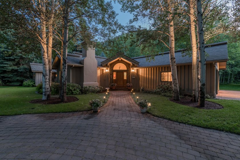 This charming home is a jewel on a mature one-acre lot. The - photo 4