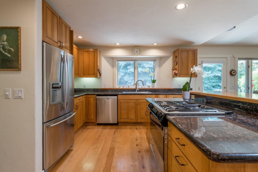 This charming home is a jewel on a mature one-acre lot. The - photo 10