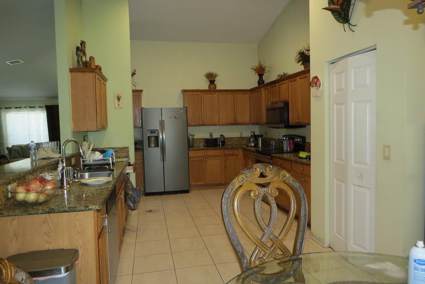 This spacious 4-bedroom, 2-bath home 2 car garage is full of - photo 7