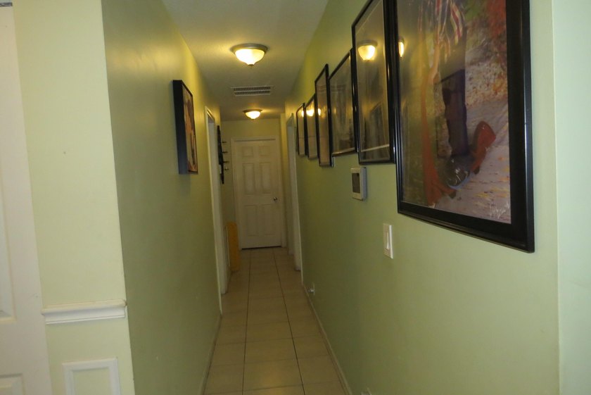 This spacious 4-bedroom, 2-bath home 2 car garage is full of - photo 8