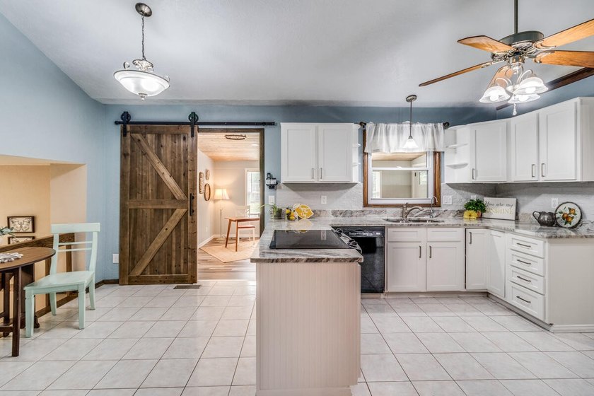 LAKE ACCESS! Spacious 4-bedroom, 2.5-bath quad-level home in - photo 9