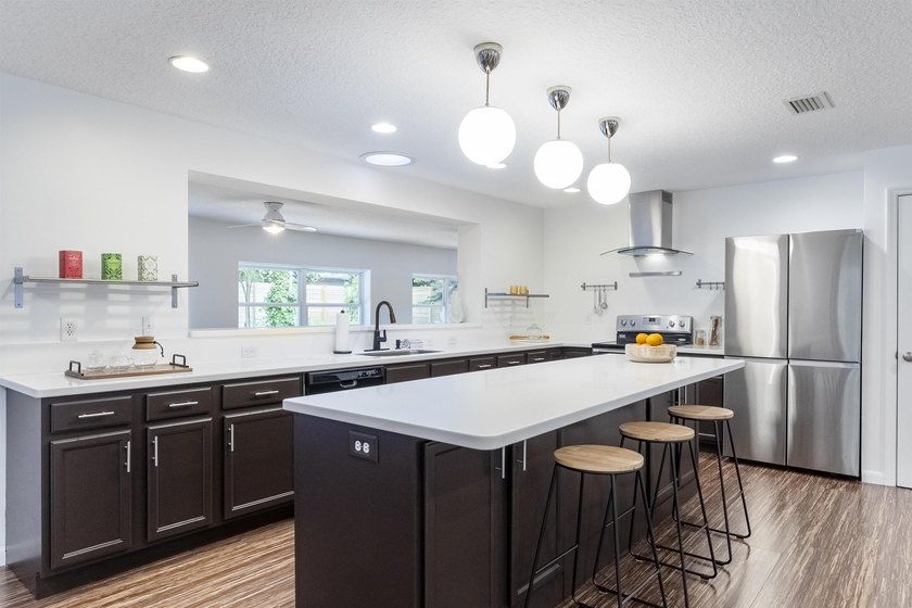 REDUCED - 3-bedroom, 3 Full bath concrete block home in the much - photo 18
