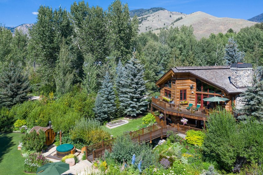 Tucked along a half-acre parcel bordering the Bigwood River - photo 2
