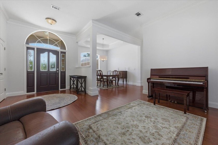 Welcome to Rocky Bayou Country Club Estates. This home offers a - photo 12