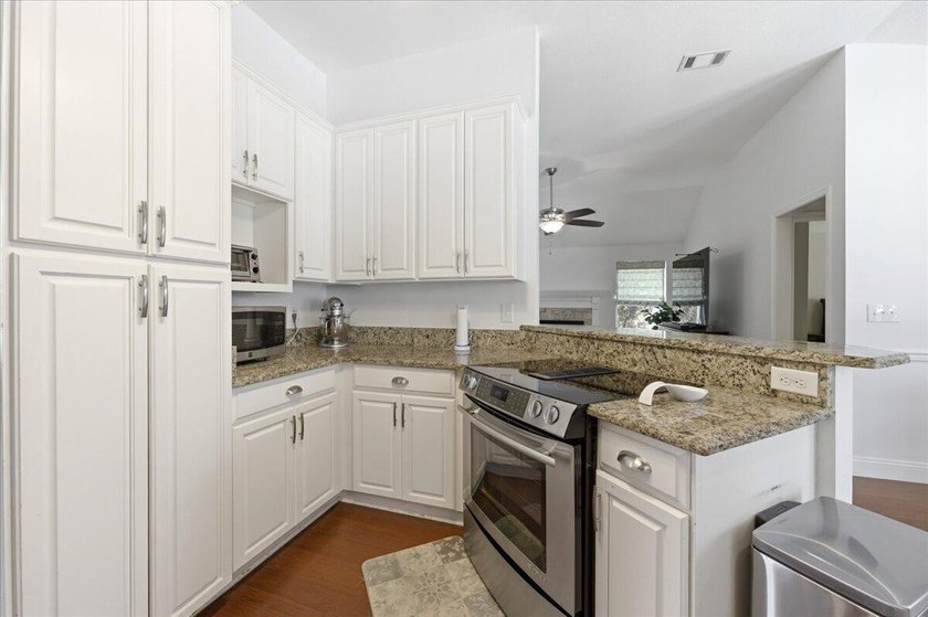 Welcome to Rocky Bayou Country Club Estates. This home offers a - photo 21