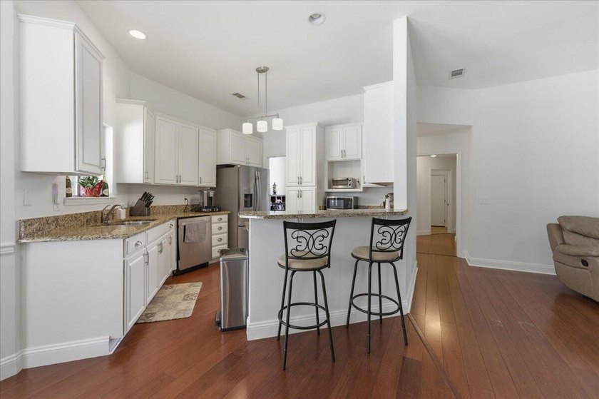 Welcome to Rocky Bayou Country Club Estates. This home offers a - photo 22