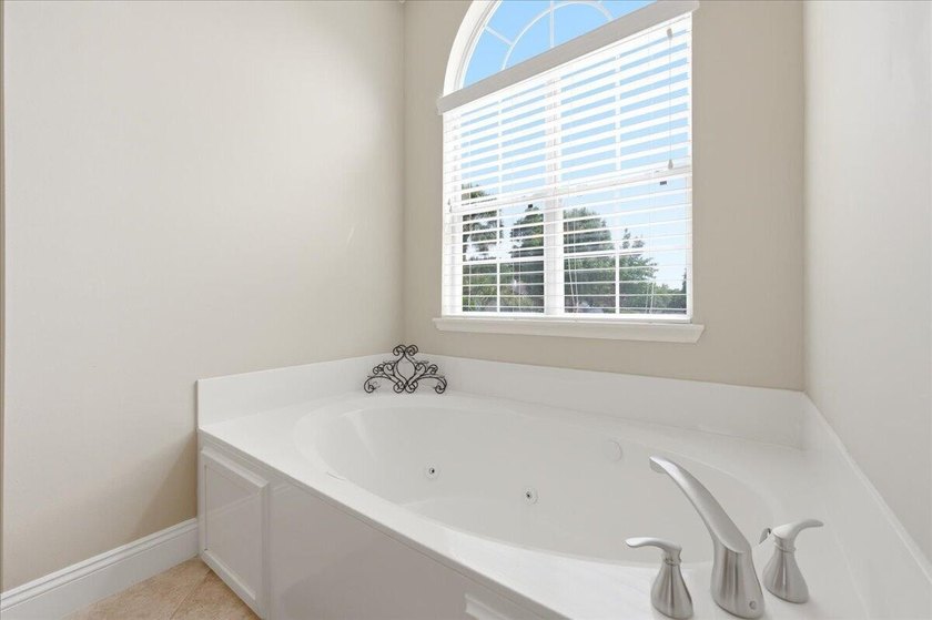 Welcome to Rocky Bayou Country Club Estates. This home offers a - photo 43