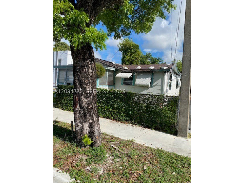 TEAR DOWN, 1929 House, Lot size is 5300 Sq.Ft, T4-L Zoned, As is - photo 2