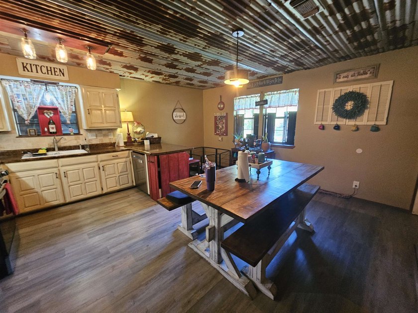 Tucked away in the gated community of Holly Lake Ranch, this - photo 11