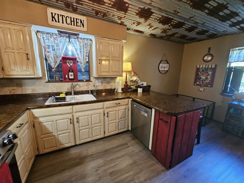 Tucked away in the gated community of Holly Lake Ranch, this - photo 12