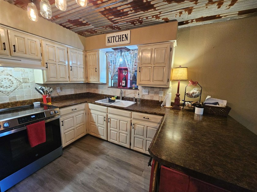 Tucked away in the gated community of Holly Lake Ranch, this - photo 13