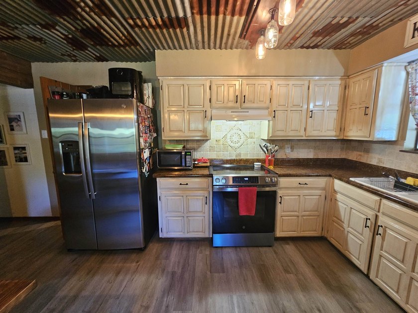Tucked away in the gated community of Holly Lake Ranch, this - photo 14