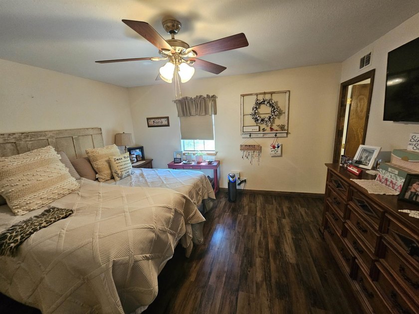 Tucked away in the gated community of Holly Lake Ranch, this - photo 16