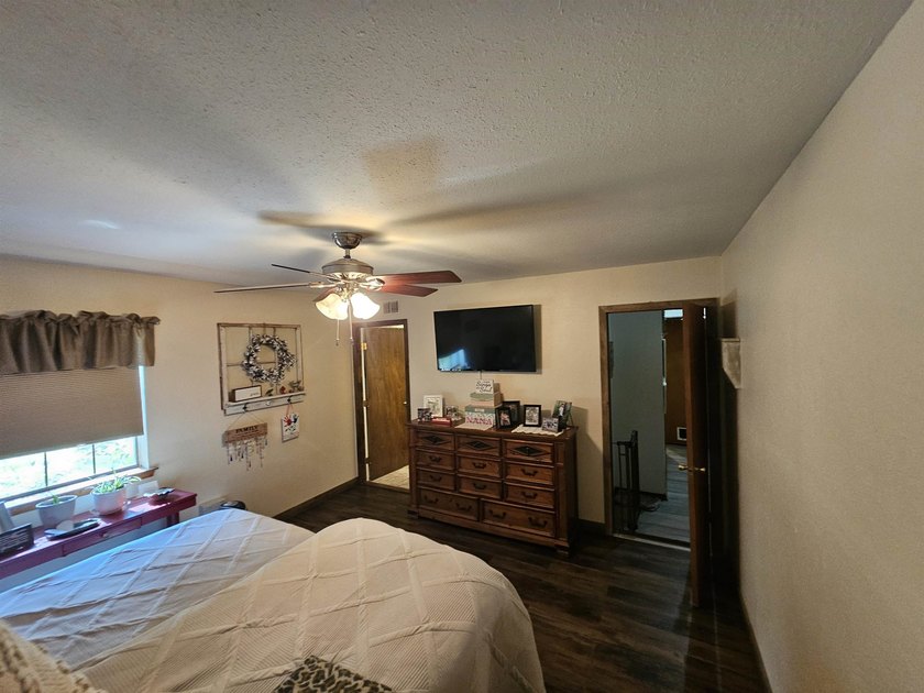 Tucked away in the gated community of Holly Lake Ranch, this - photo 17