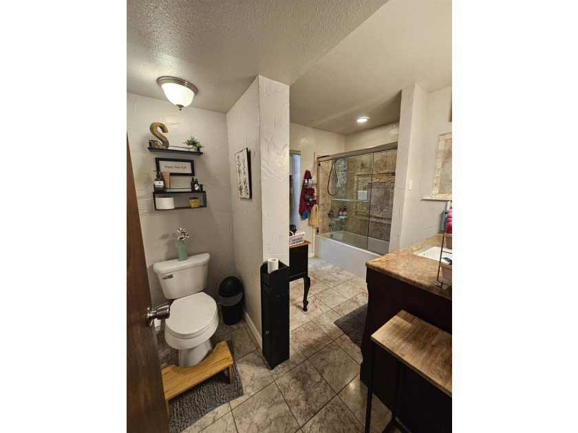 Tucked away in the gated community of Holly Lake Ranch, this - photo 18