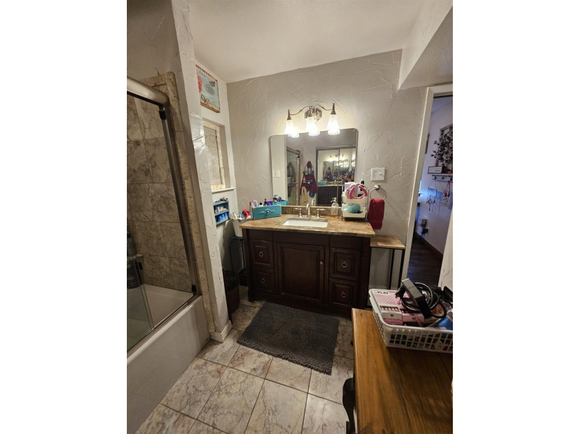 Tucked away in the gated community of Holly Lake Ranch, this - photo 22