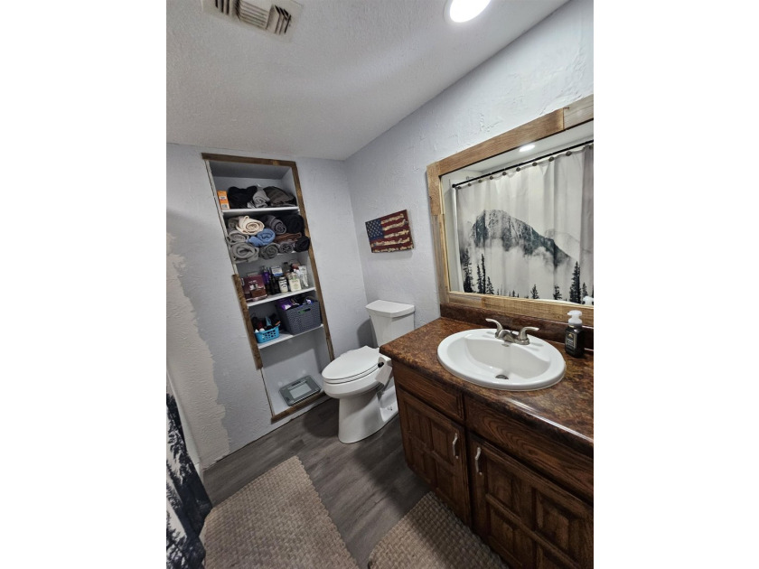 Tucked away in the gated community of Holly Lake Ranch, this - photo 31