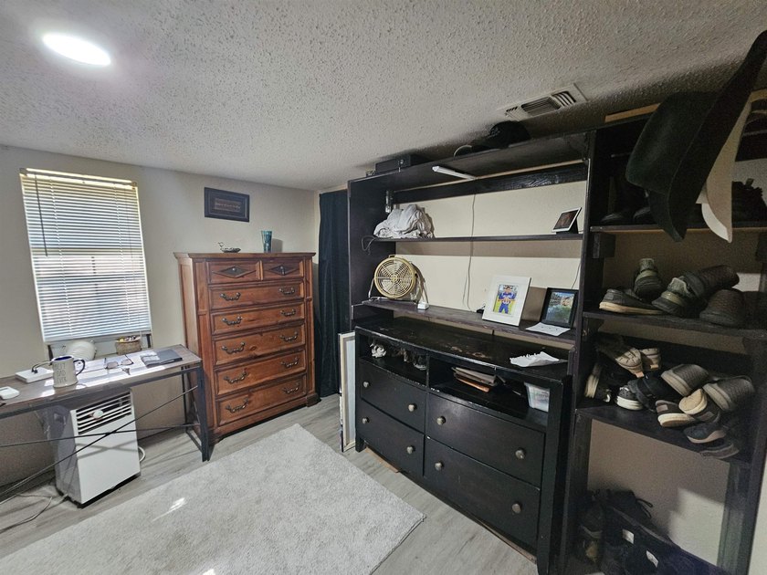 Tucked away in the gated community of Holly Lake Ranch, this - photo 35
